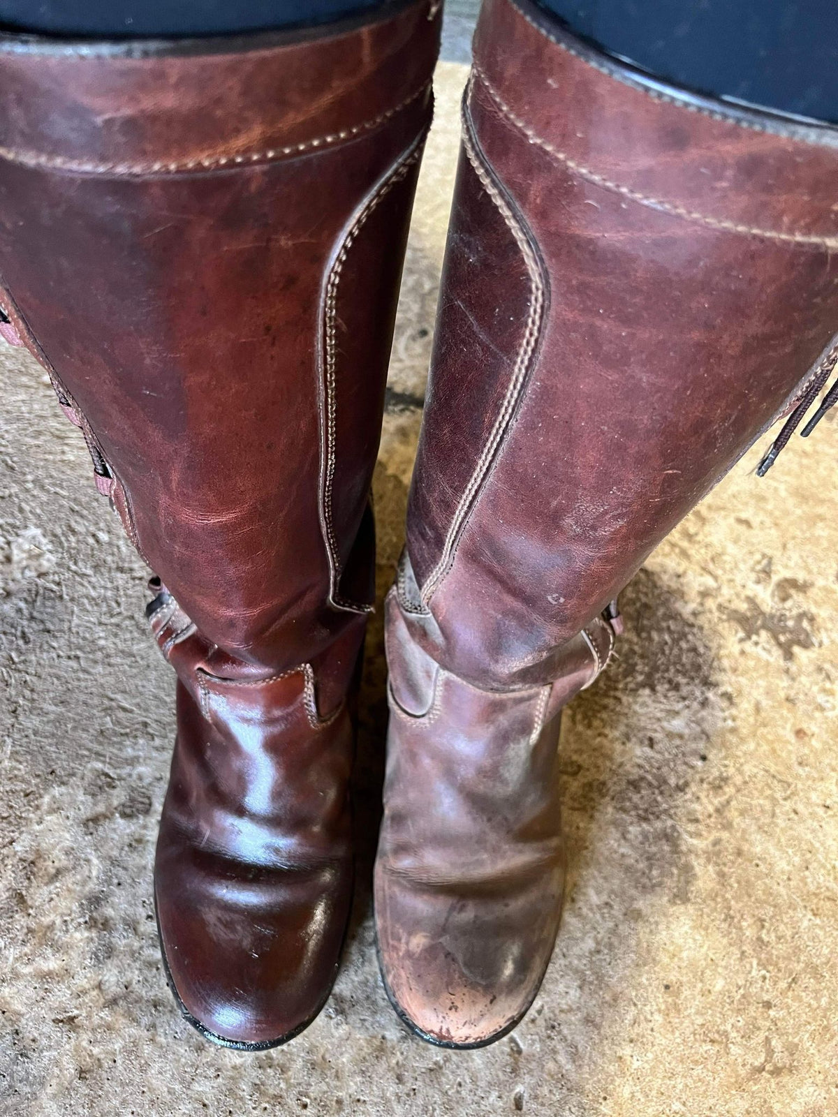 Old riding boots that have not had much care, the boot on the left has been conditioned with Belvoir Leather Balsam. The boot on the right has not.
